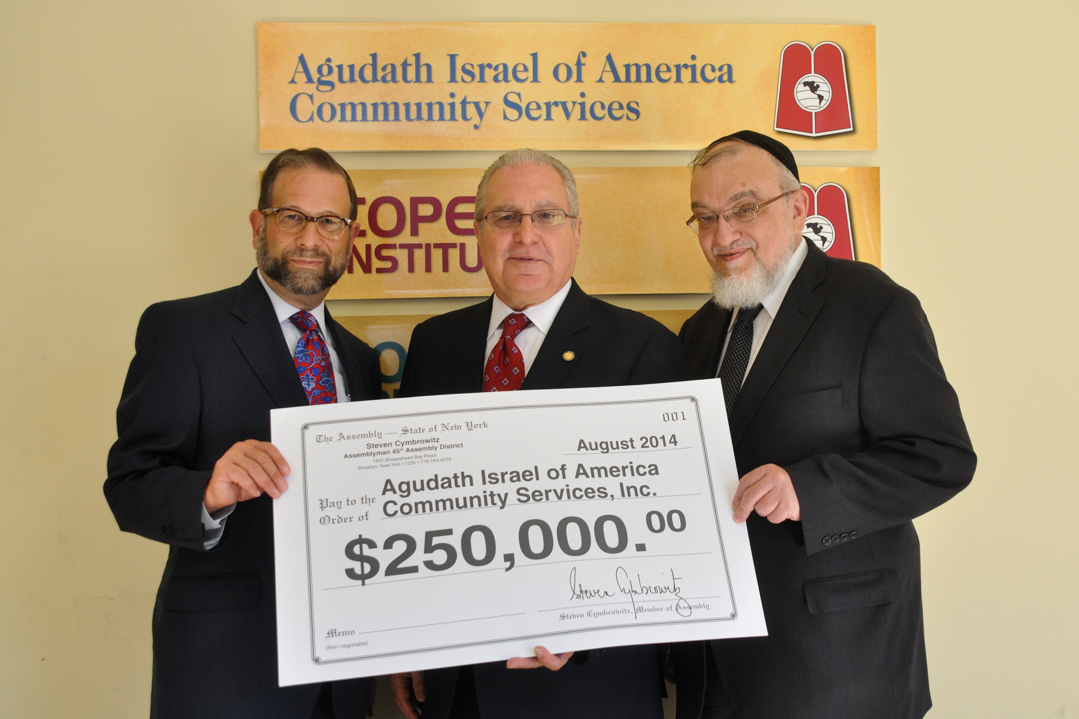 Steve Cymobrowitz presents the Capital Grant to Rabbi Shmuel Lefkowitz of Agudath Israel of America and Leon Goldenberg whom was a Key member of the team which sought to secure these funds for COPE institute. 
